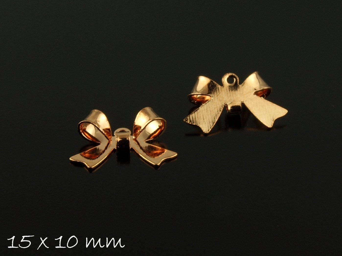 4 Stück Schleife Anhänger rosegold 10 x 15 mm