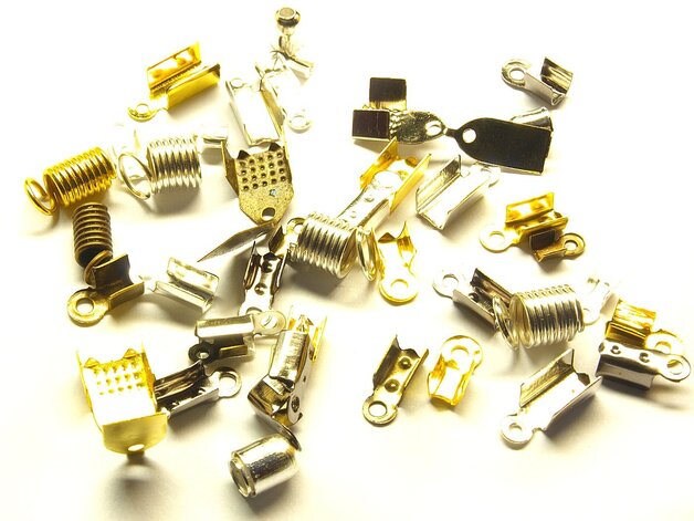 0,10EUR/m - 25 g Lederband Endkappen Mix gold silber bronze