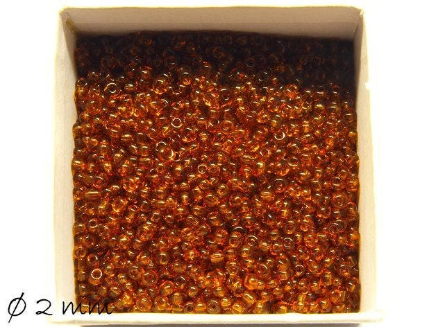 0,05EUR/g - 50 g Rocailles transparent braun 2 mm #12 Perlen