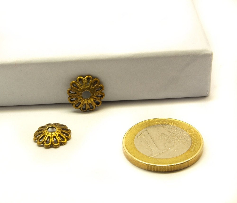 10 Stück Perlenkappen, keltisch bronze 11 mm