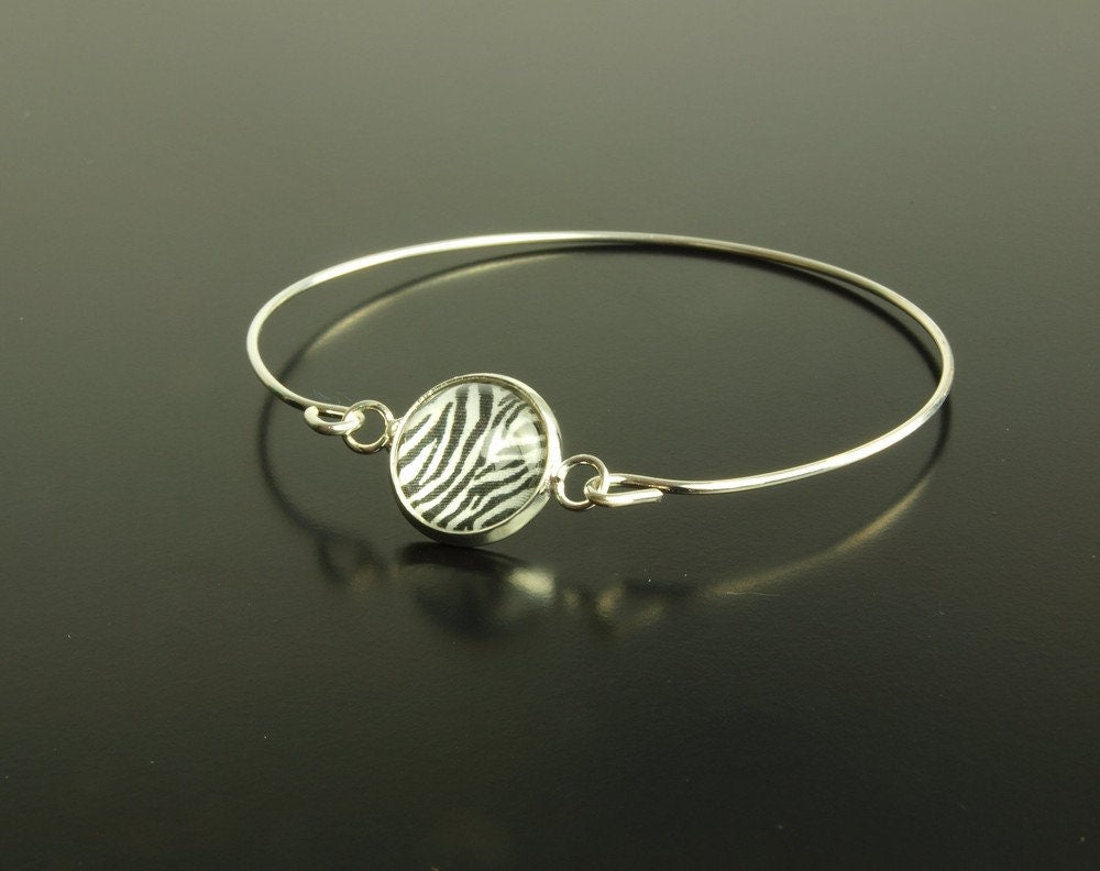 Armreif Cabochon weiß schwarz Zebra Muster silbern