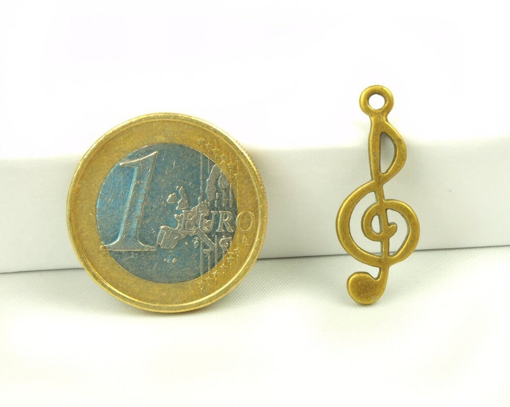 6 Stück Anhänger Notenschlüssel, bronze, 25 x 10 mm