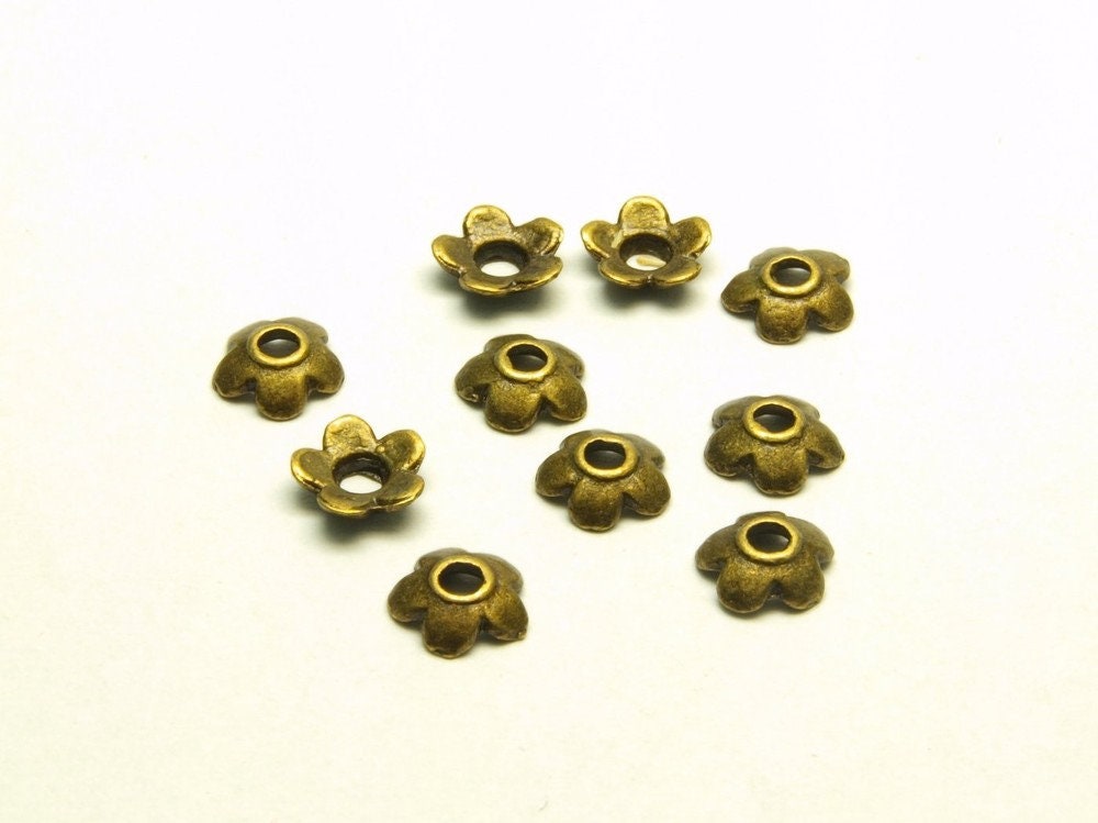 20 Stück Perlenkappen, Blüte bronze Ø 6 mm