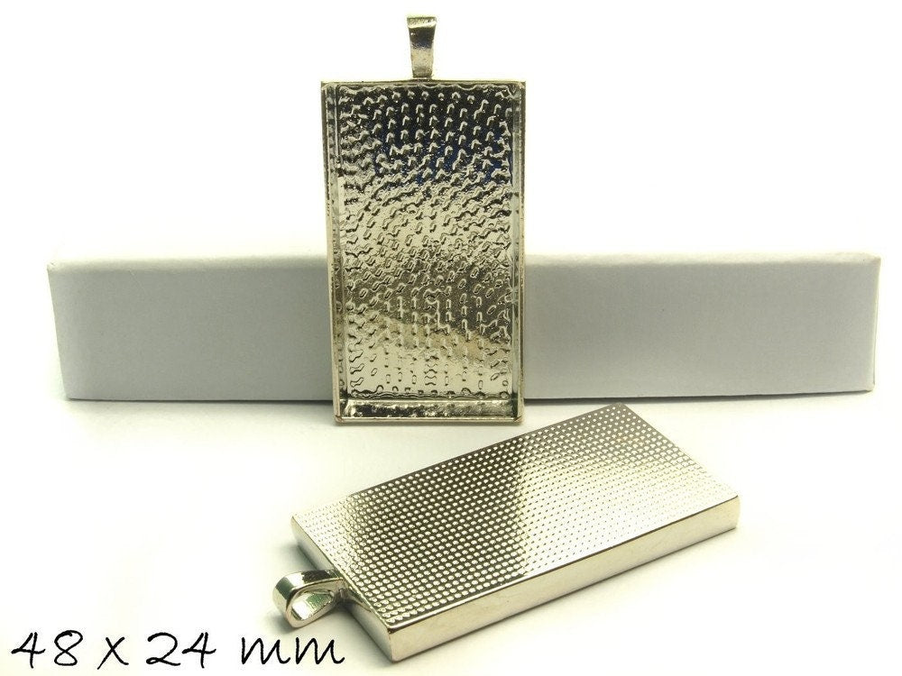 2 Stück Anhänger mit Fassungen für Cabochons, 48 x 24 mm in altsilber