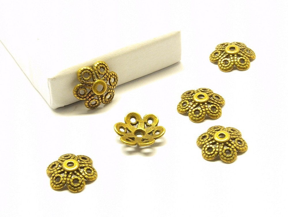 10 Stück Perlenkappen, keltisch bronze vintage 11 mm