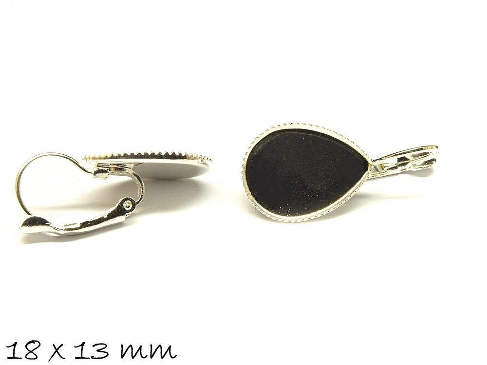 4 Stück Brisuren mit tropfenförmiger Cabochonfassung in silber 18 x 13 mm