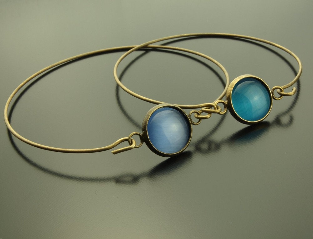 2 Stk Armreifen Cateye Cabochon Glas blau vintage bronze