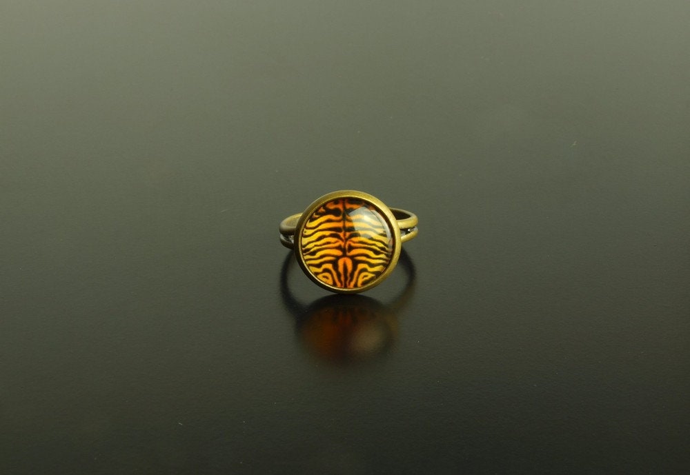 Ring Cabochon Glas bronze Muster Tiger Leo Afrika