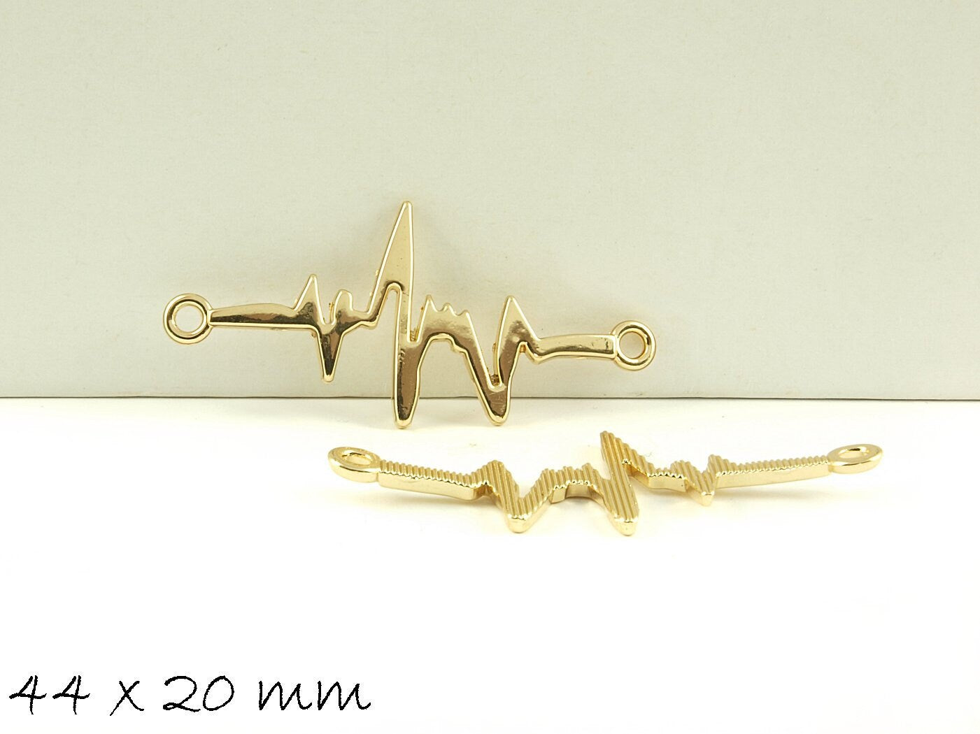 4 Stück Verbinder Herzschlag gold 44 x 20 mm