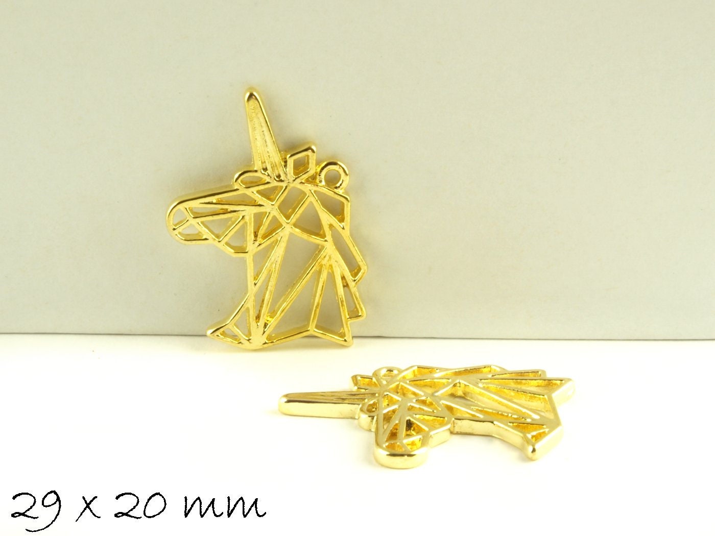 4 Stück Anhänger Origami Einhorn gold 29 x 20 mm