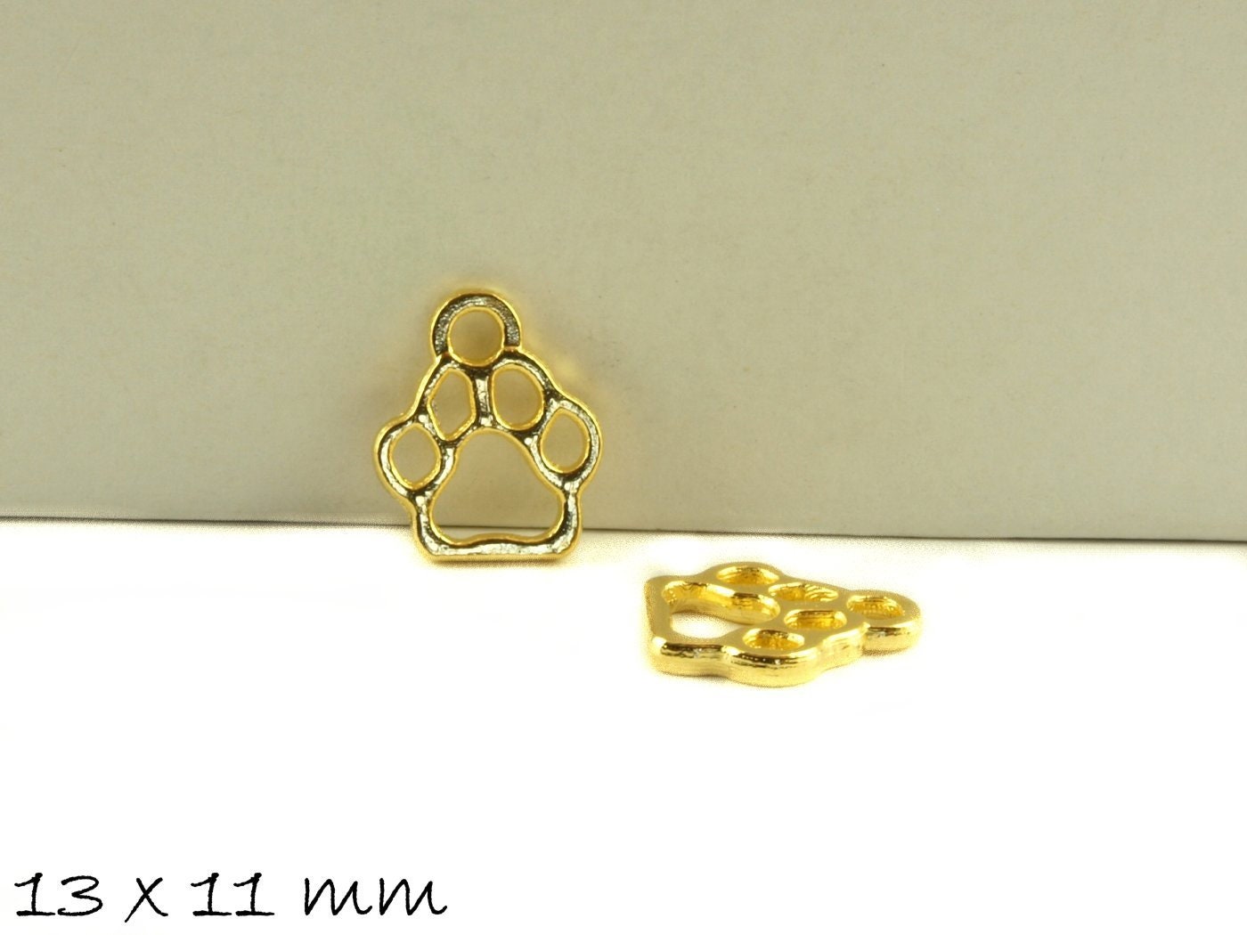 6 Stück Anhänger Pfote Abdruck Bär altgold, 13 x 11 mm