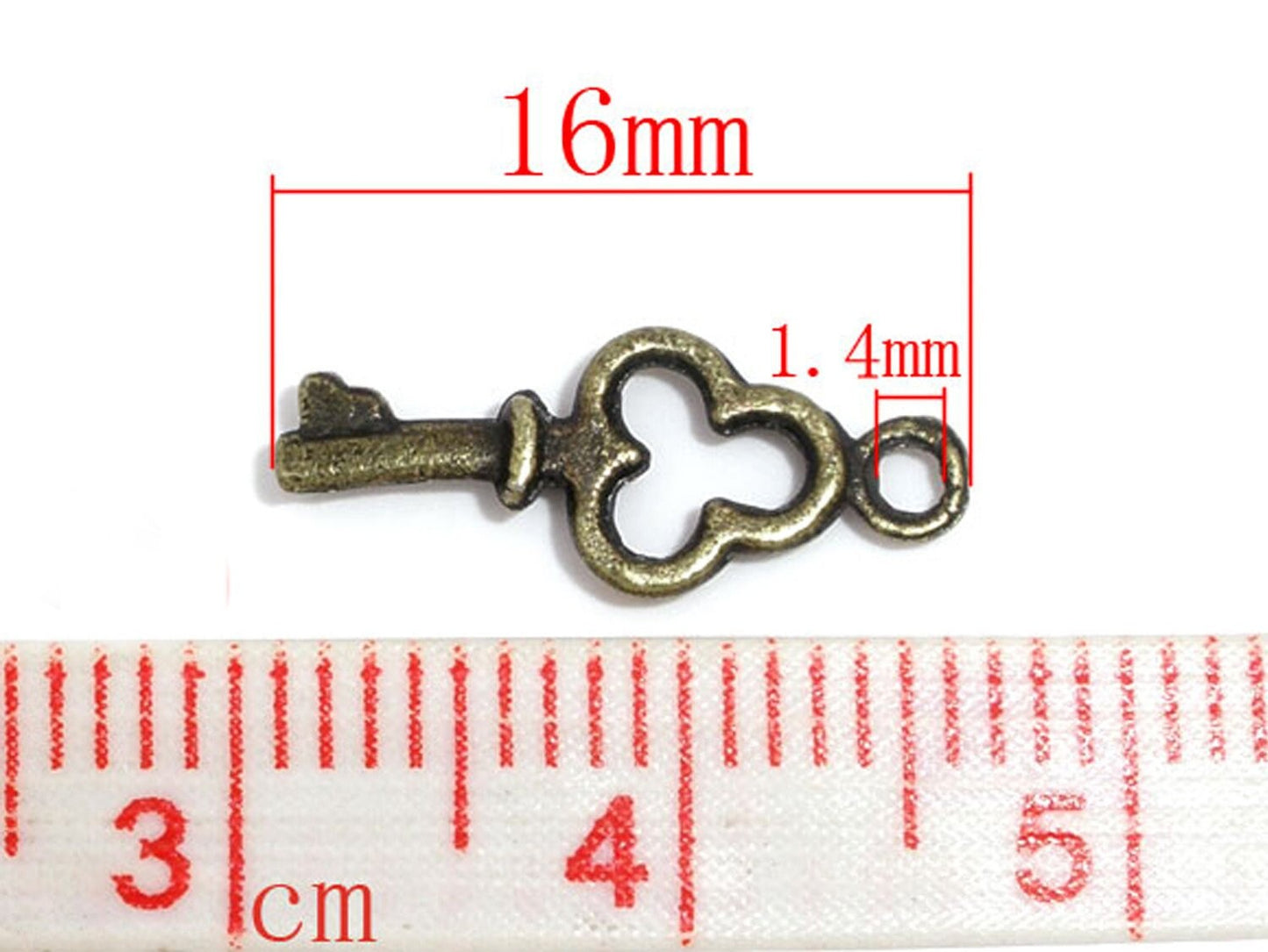 10 Stück Anhänger Schlüssel in bronze 16 x 6 mm