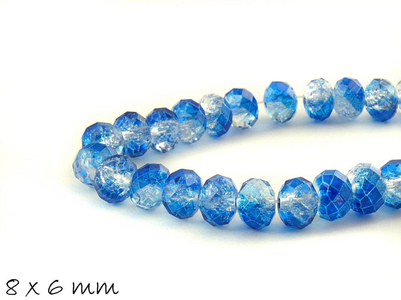 10 Stück Glassschliffperlen, facettiert, blau-transparent, 8 x 6 mm