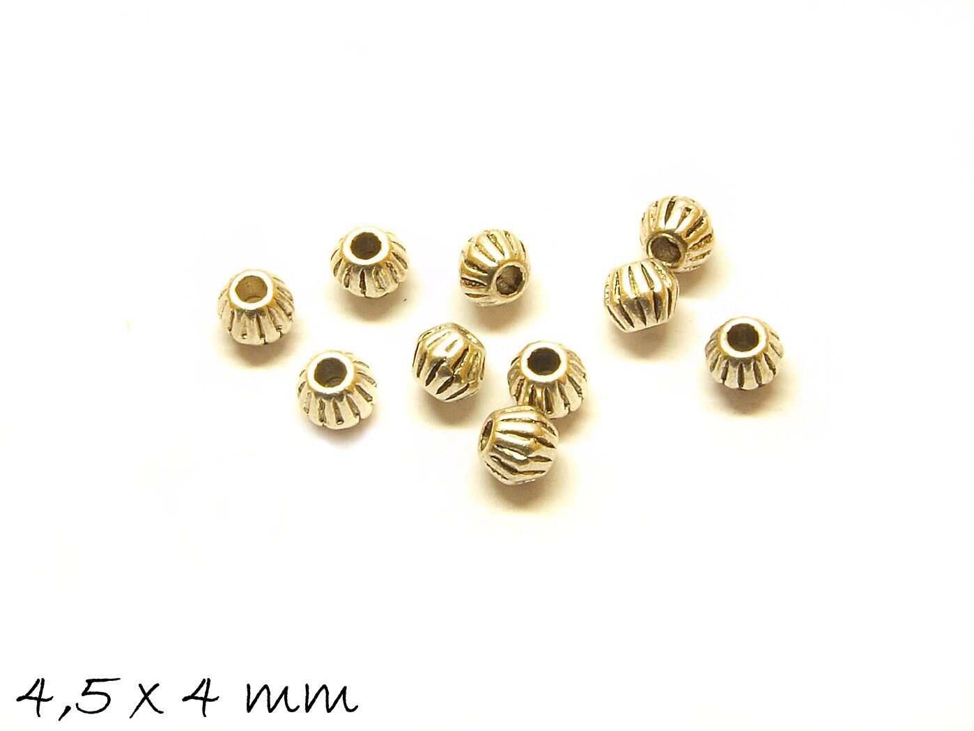 20 Stück Spacer Perlen Polygon 4,5 x 4 mm in altsilber