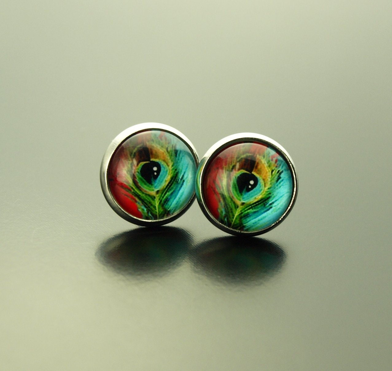 Ohrringe nach Wahl Federn Pfau bunt Glas Papier Cabochon als Ohrstecker / Ohrhänger in silber / bronze / golden