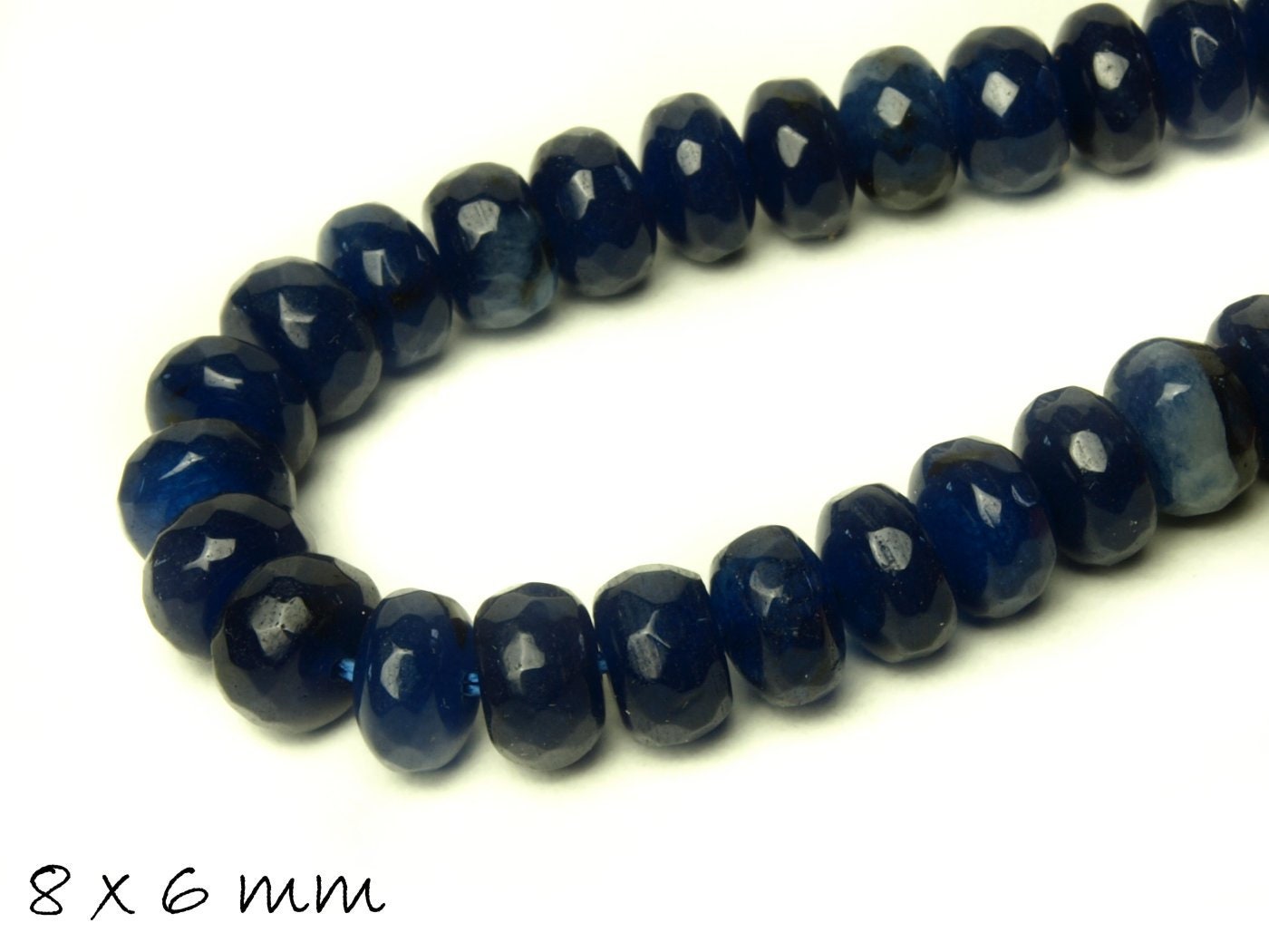 10 Stück facettierte Jade Perlen oval 8 x 6 mm blau