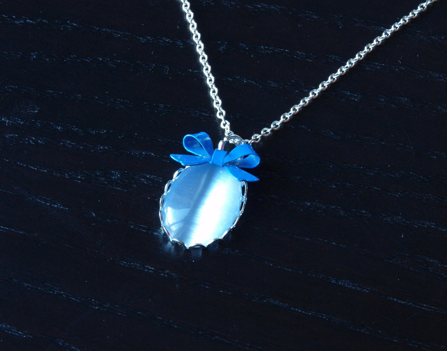 Kette Cabochon Glas silber bronze golden Cateye grün blau orange Schleife