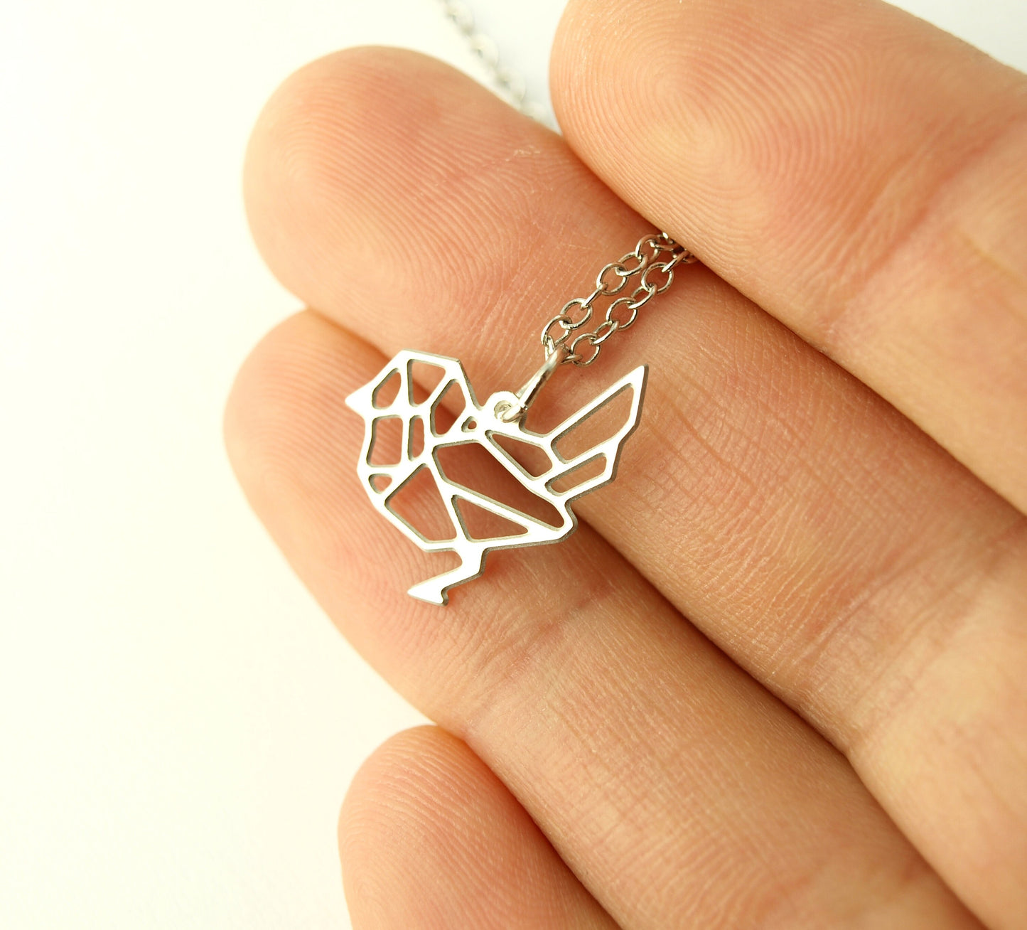Kette Vogel Spatz geometrisch Edelstahl Anhänger silbern