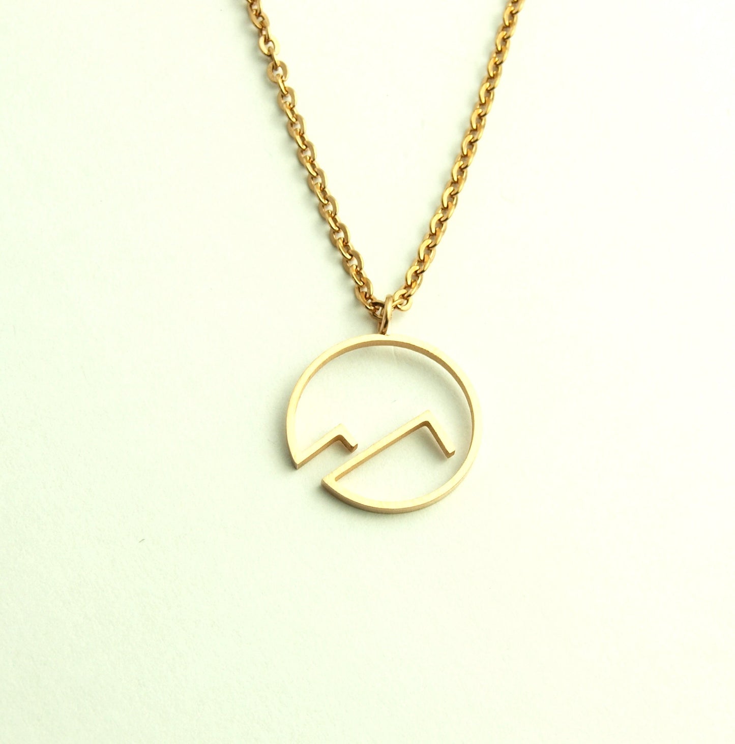 Kette Berge Schnee Landschaft geometrisch rund Edelstahl Anhänger rosé golden