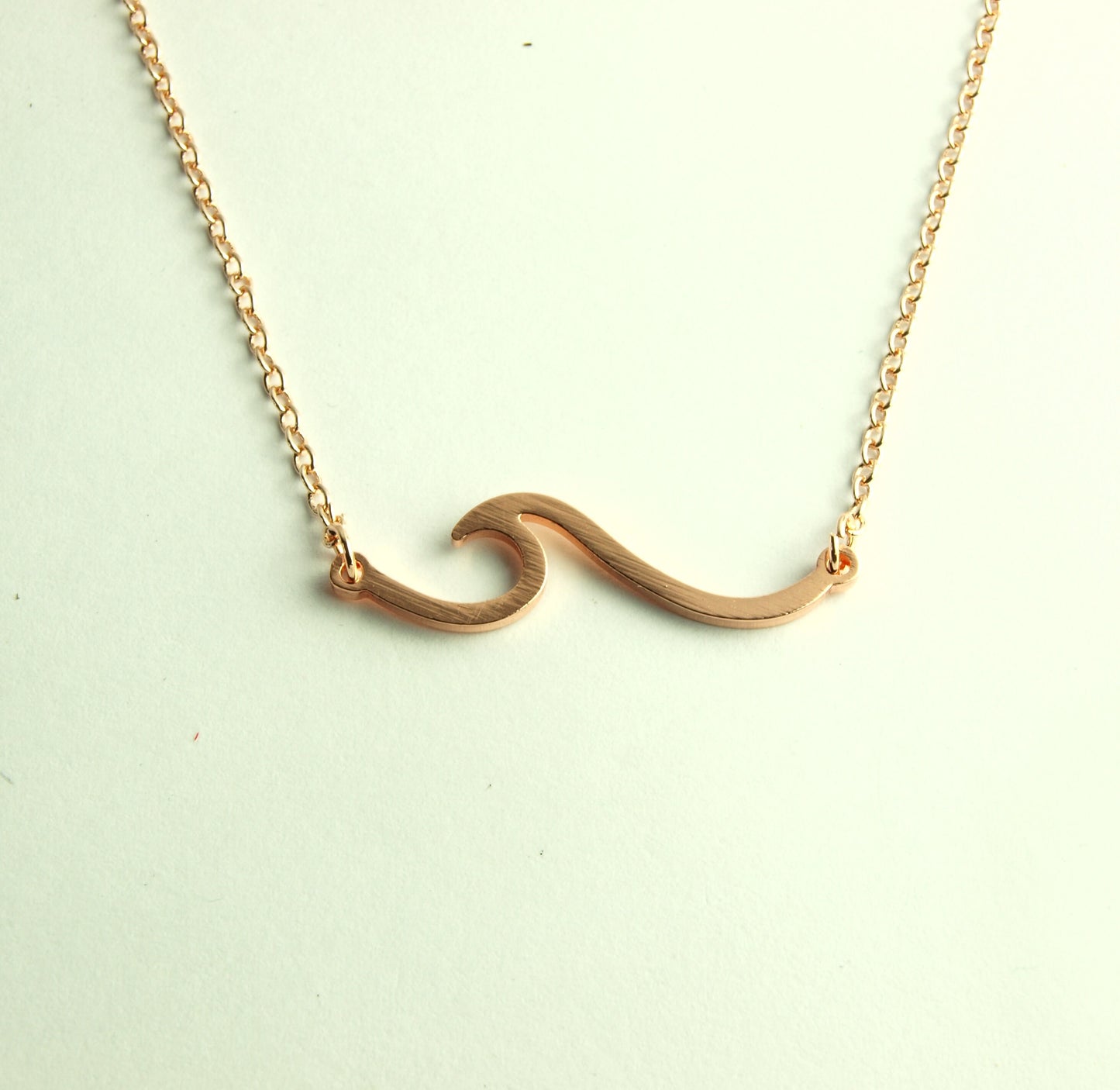 Kette Welle Wasser Anhänger rosé golden