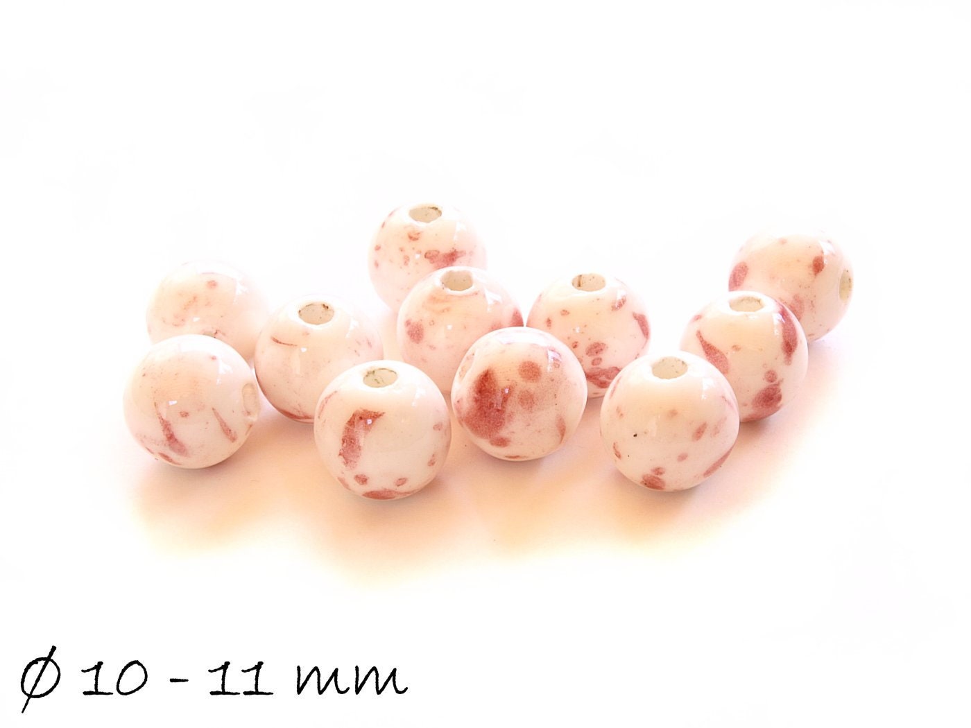 10 Stück Porzellan Perlen Ø 10 - 11 mm, rot-weiß