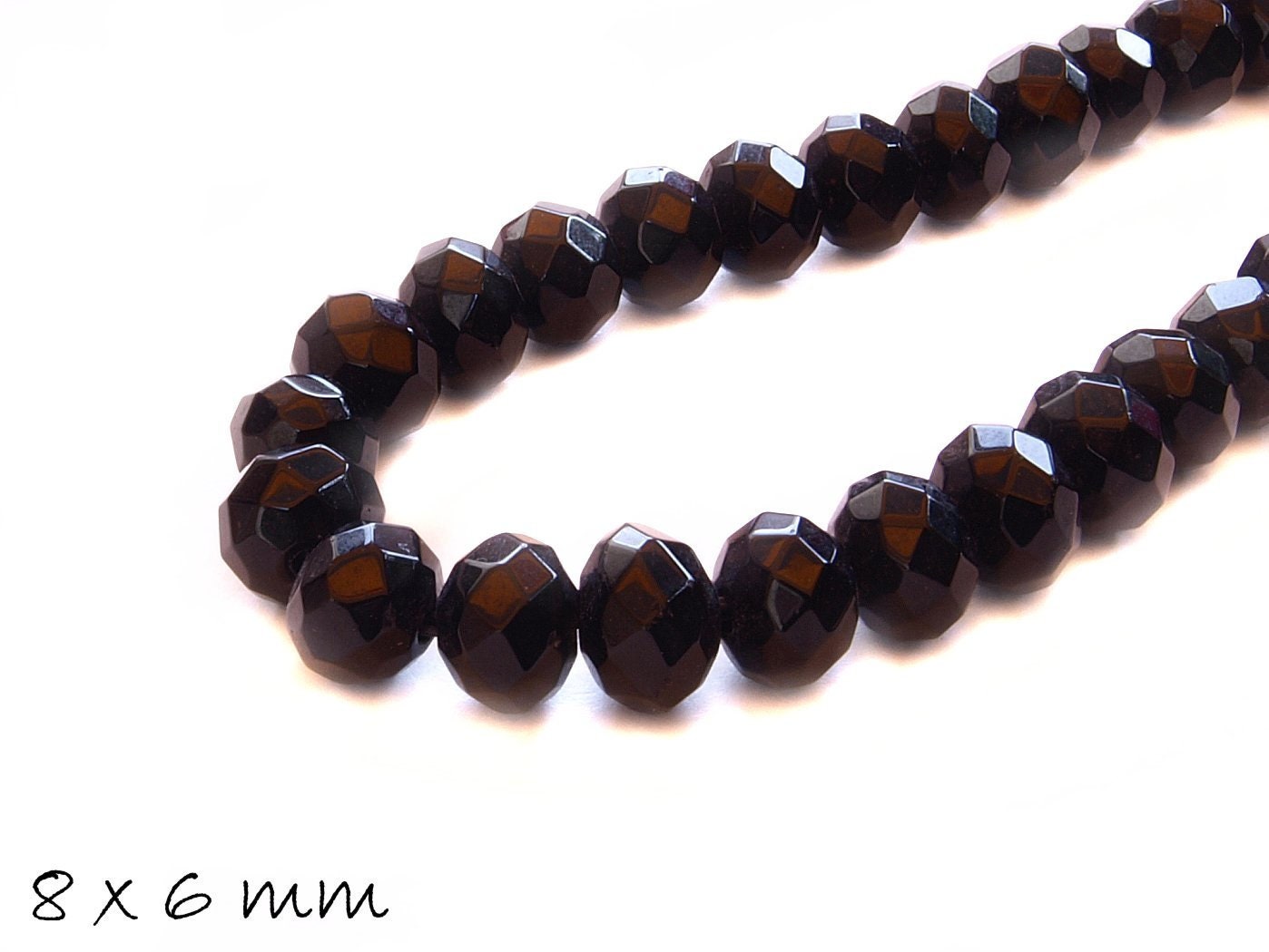 10 Stück facettierte Jade Perlen oval 8 x 6 mm, schwarz