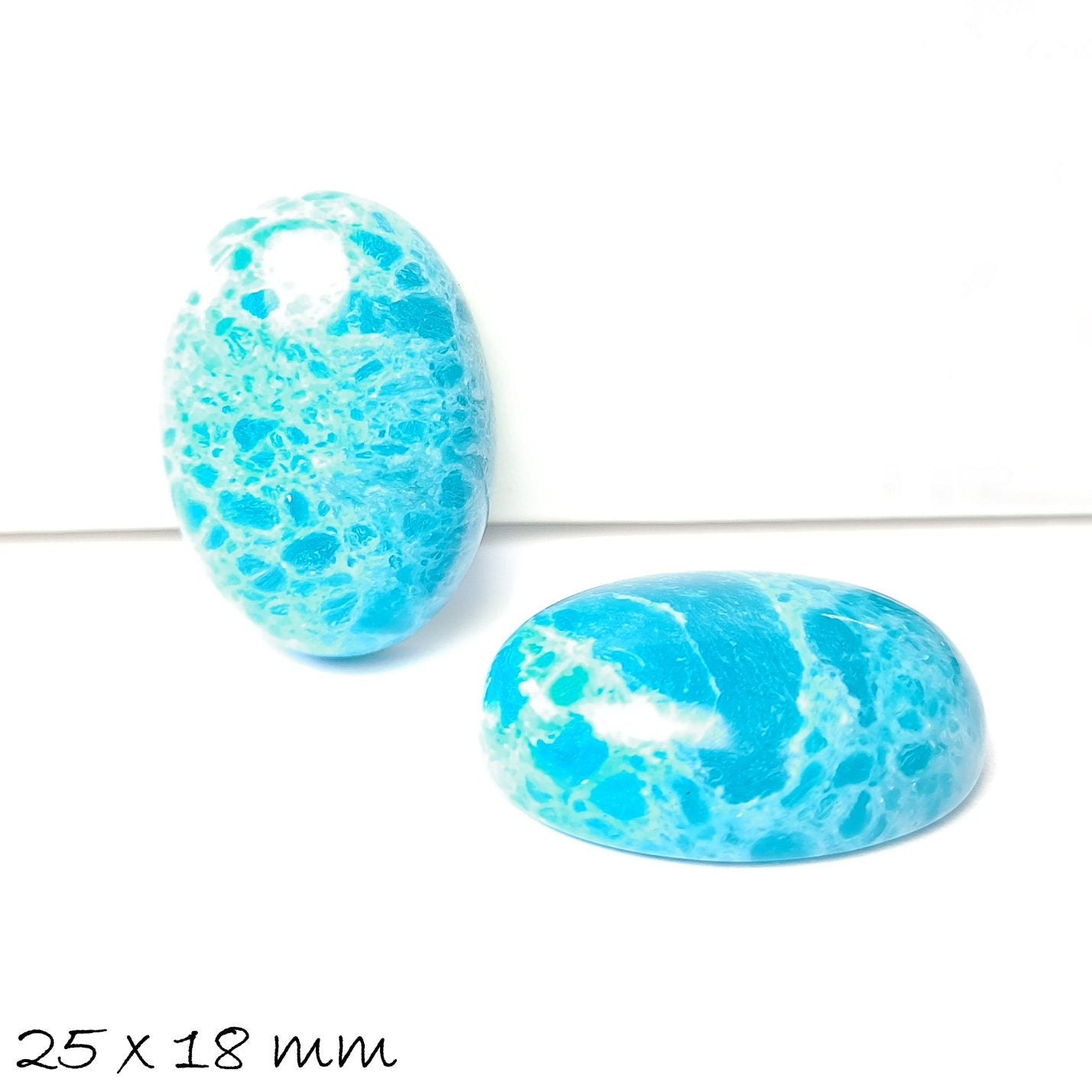 1 Stück Edelstein Cabochon See Sediment, Seekorn 25 x 18 mm, hellblau