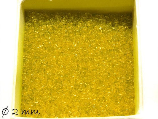 0,05EUR/g - 50 g Rocailles transparent gelb 2 mm #16 Perlen