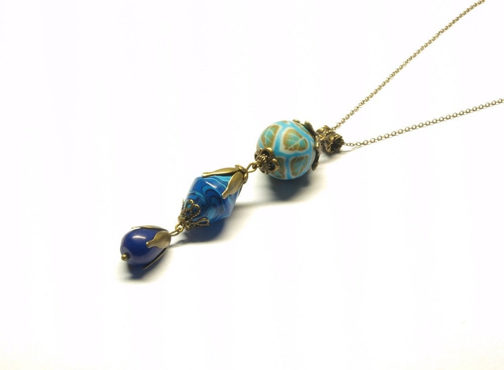 Kette bronze vintage Clay Jade Perle blau Blatt