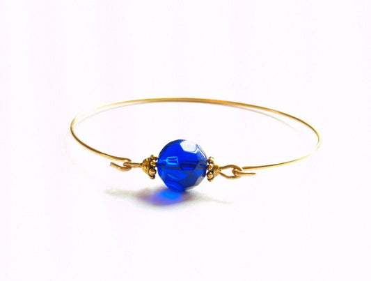 Armreif Glas Perle Spiraldraht gold blau Schliff