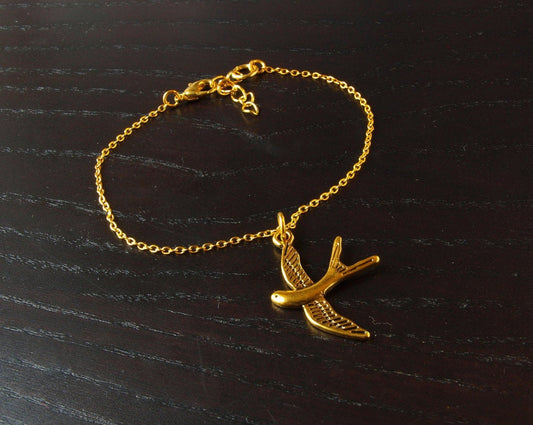 Armreifen Kette Anhänger Vogel golden Bettelkette