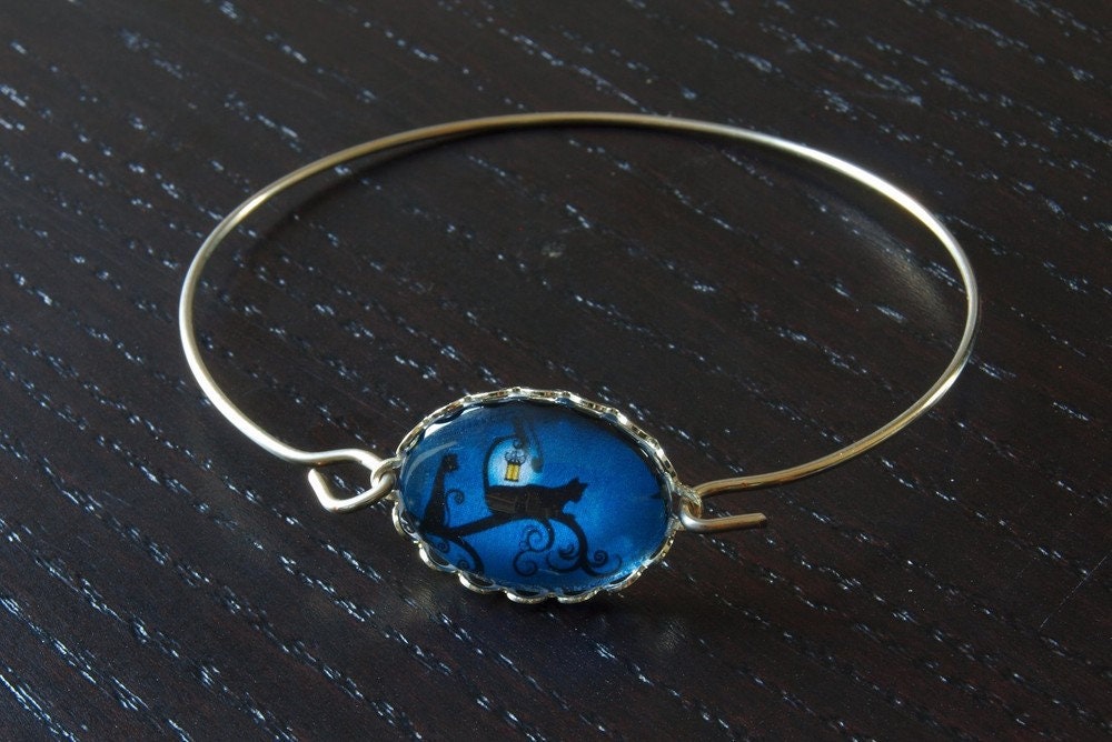 Armreif Cabochon Glas Katze Spiralreif silber blau