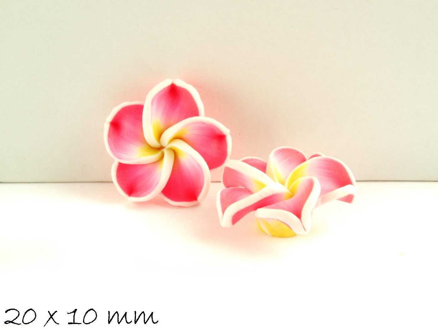 4 Stück Frangipani Blüten Fimo Clay rosa 20 x 9 mm