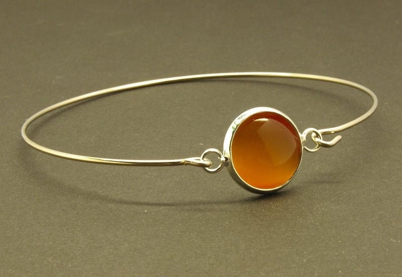 Armreif nach Wahl Cabochon Cateye Glas Spiralreif silbern bronze golden blau grün braun lila weiß beige orange Juvelato